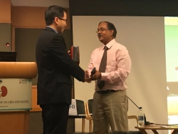 presenting a memento to dr. benjamin i chung durin